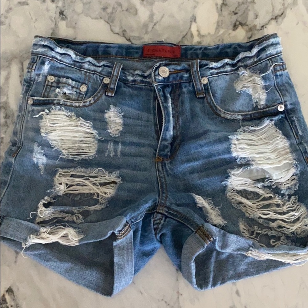 Small ripped denim shorts